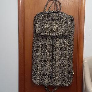 Traveling garment bag with carry on bag